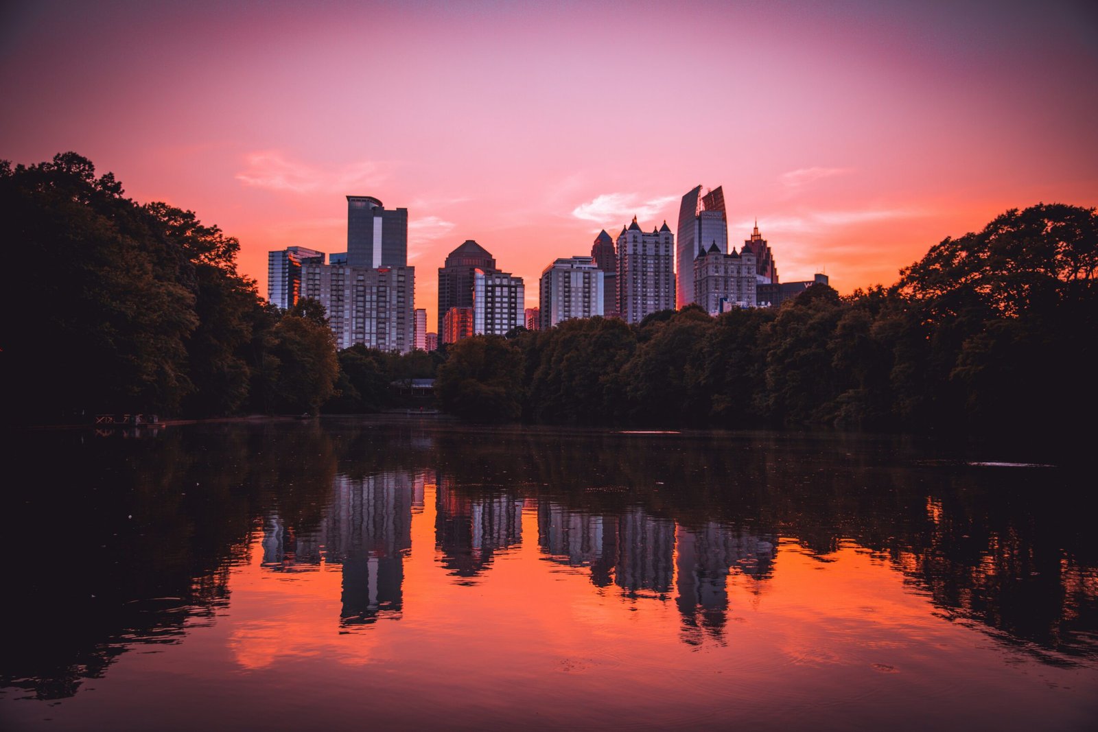 Atlanta skyline reflected at Piedmont Park at sunset